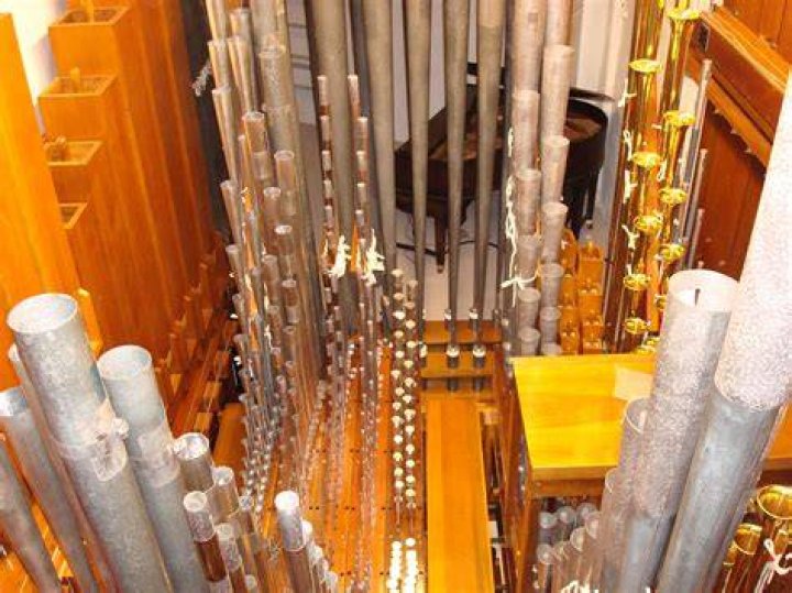 Cleaned, repaired and tuned, organ pipes in loft behind facade are among 4,200 pipes<BR> in 70 ran