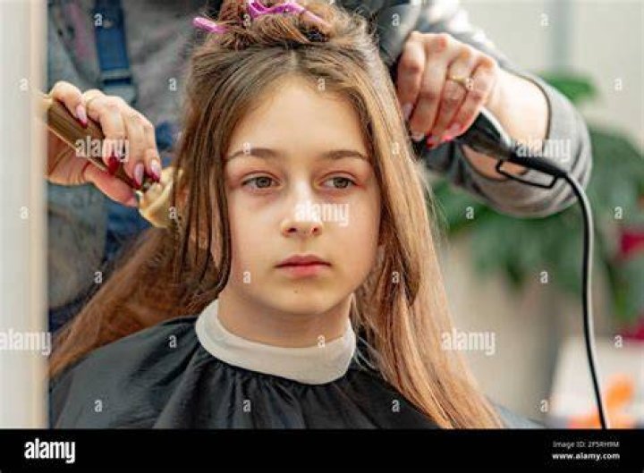 She play-styled her hair to the sound of Uptown Girl, by Billy Joel